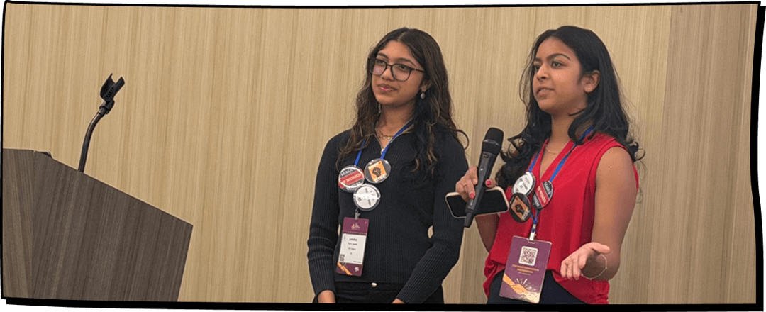 Students speaking at a podium